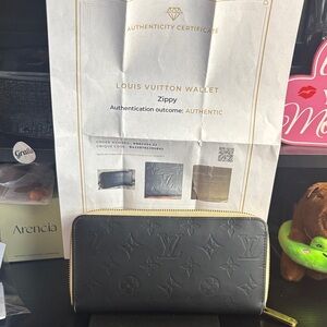 Louis Vuitton Black Embossed Zippy Wallet with COA